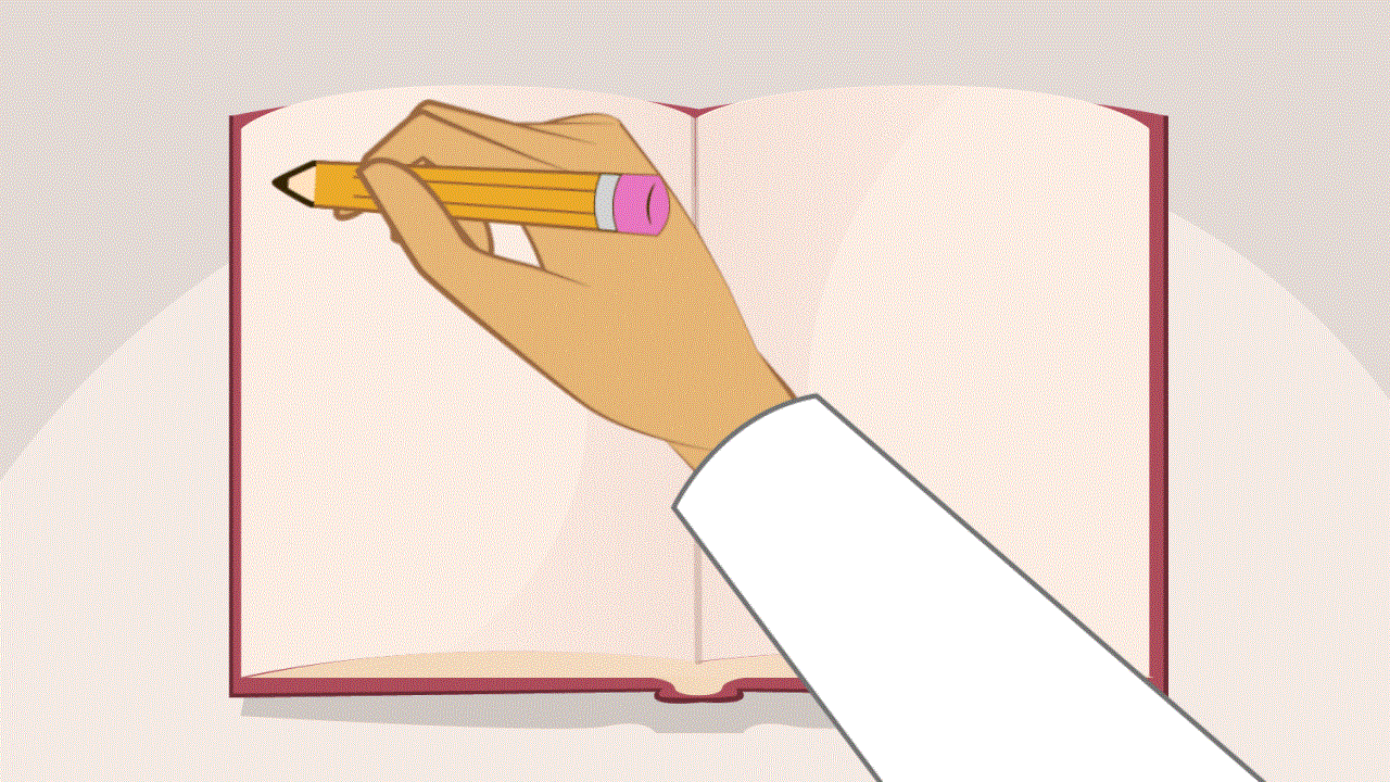 Libro abierto junto a una mano que sostiene un lapiz.